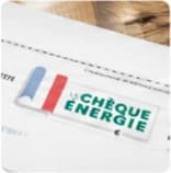 Chèque énergie posé sur une table
